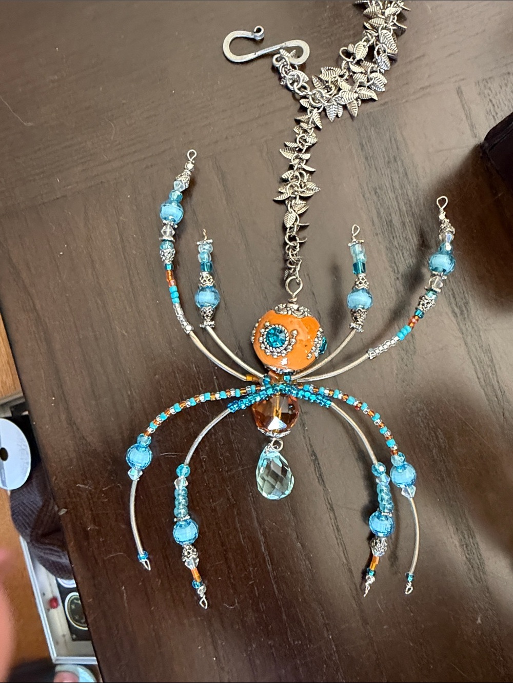 Turquoise and Amber coloured Spider. Window hanger. One of a kind.